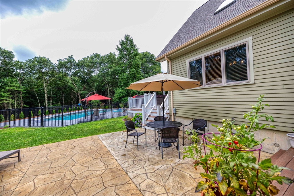 78 Howland Road Assonet, MA 02702 - Photo 31 of 41 a view of a house with backyard and sitting area
