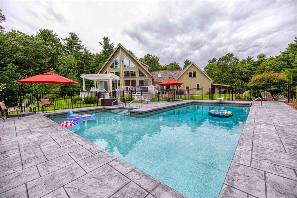 78 Howland Road Assonet, MA 02702 - Photo 35 of 41 a view of a house with swimming pool and a yard