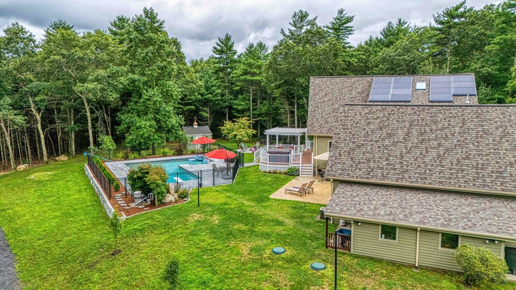 78 Howland Road Assonet, MA 02702 - Photo 37 of 41 a backyard of a house with seating space