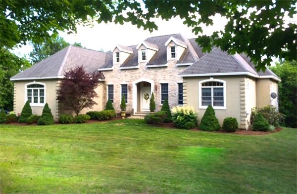 615 Mason Road Ashby, MA 01431 - Photo 1 of 22 a front view of a house with a garden