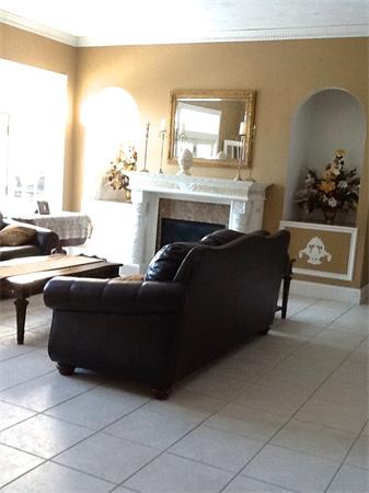 615 Mason Road Ashby, MA 01431 - Photo 12 of 22 a living room with furniture and a fireplace