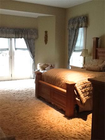 615 Mason Road Ashby, MA 01431 - Photo 18 of 22 a bedroom with a bed and a window