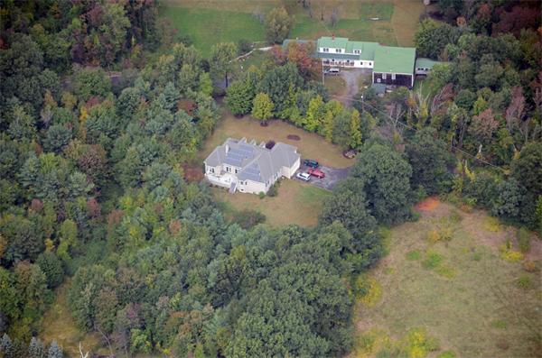 615 Mason Road Ashby, MA 01431 - Photo 20 of 22 an aerial view of a house with a yard and lake view