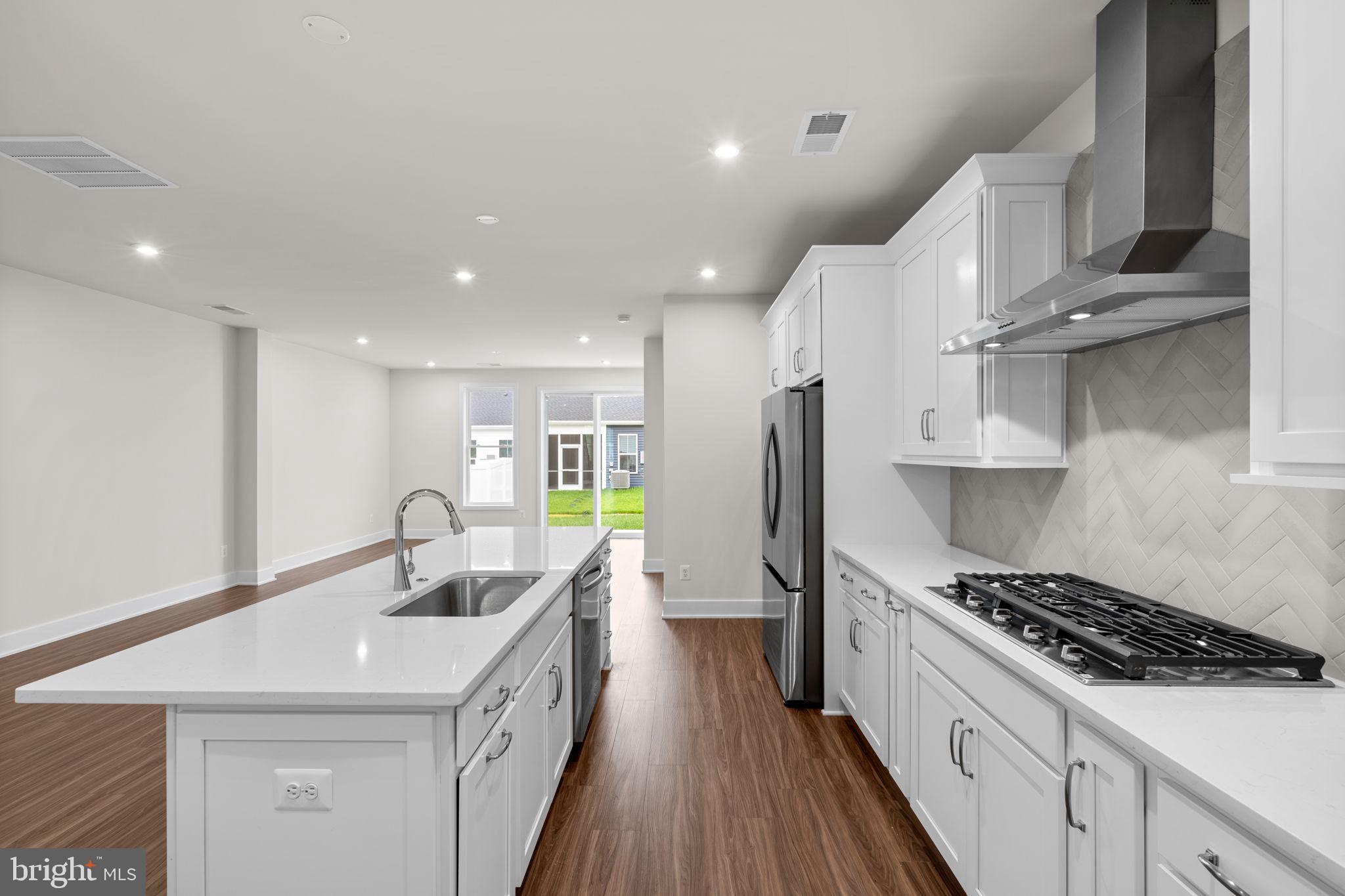 114 Keystone Winchester, VA 22603 - Photo 17 of 44 a kitchen with stainless steel appliances granite countertop a sink a stove and a refrigerator