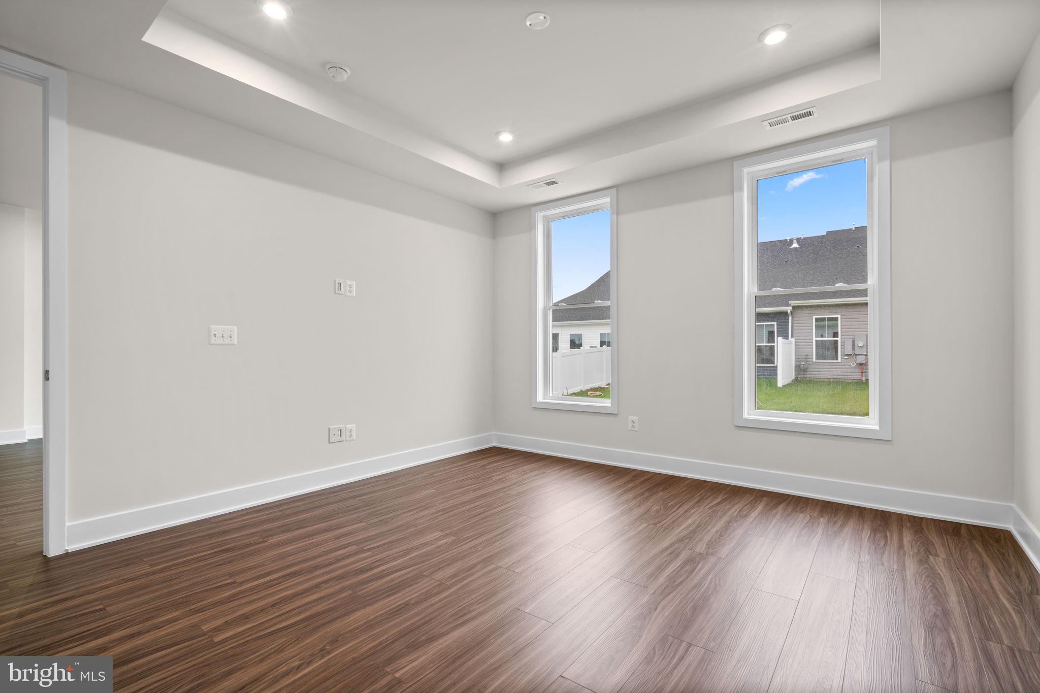 114 Keystone Winchester, VA 22603 - Photo 21 of 44 an empty room with wooden floor and windows