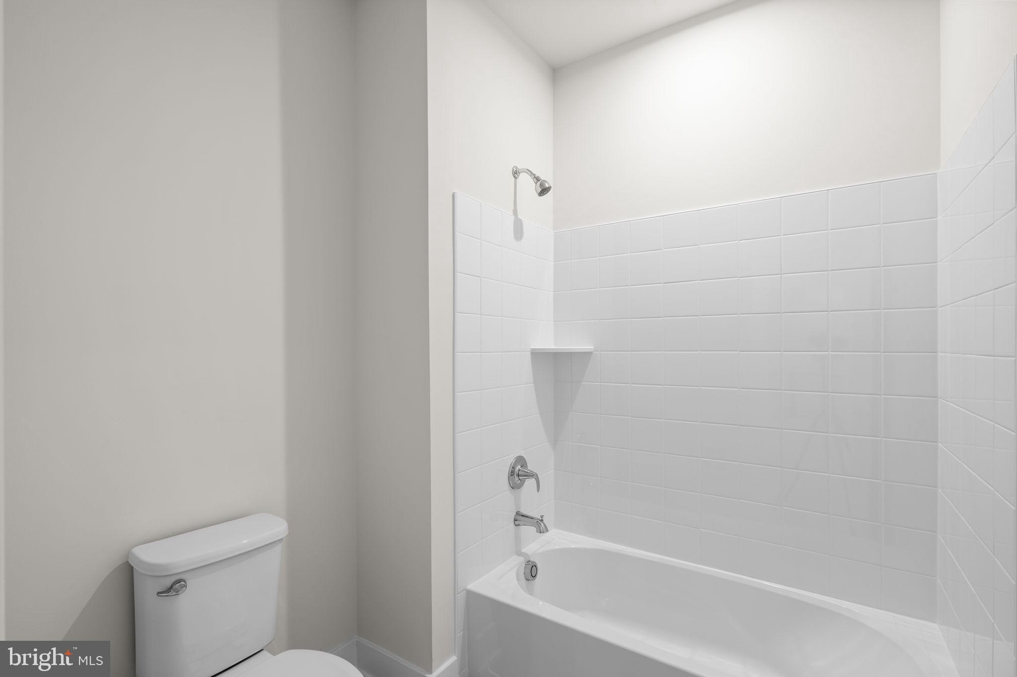 114 Keystone Winchester, VA 22603 - Photo 33 of 44 a bathroom with a bathtub and a toilet