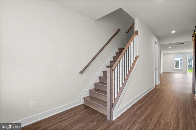 a view of entryway with wooden floor