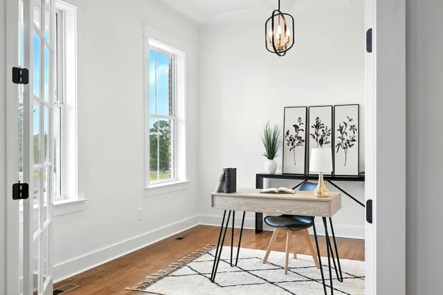 a kitchen with a sink a stove and cabinets