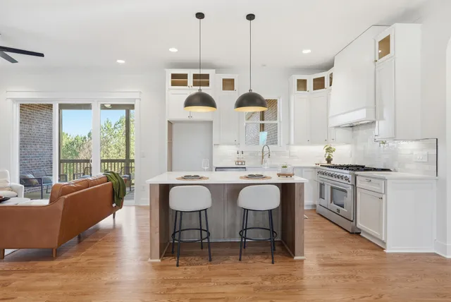a kitchen with appliances cabinets and a window