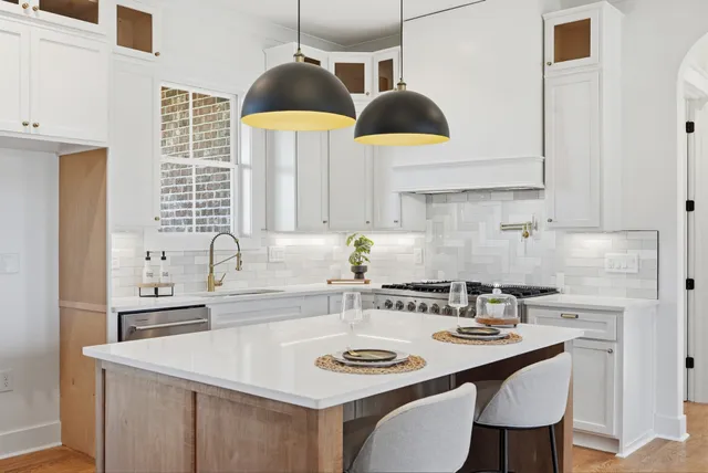 a view of a patio with a table and chairs