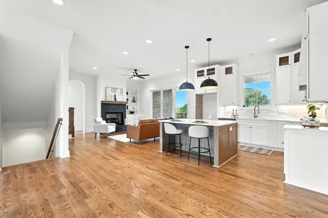 a living room with a bed furniture and a window