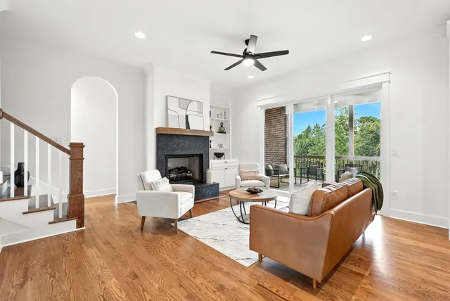 a bathroom with a double vanity sink a mirror and a bathtub