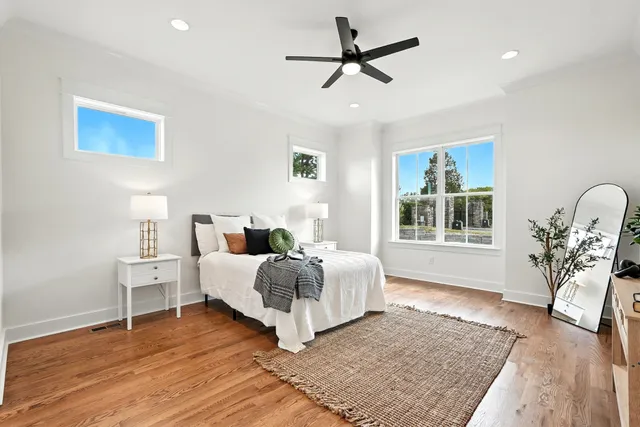 a bathroom with a toilet a sink and a mirror