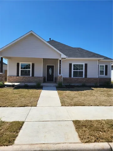 a view of a house with swimming pool