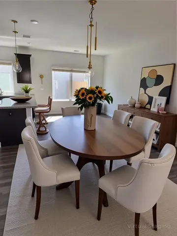 a view of a dining room with furniture