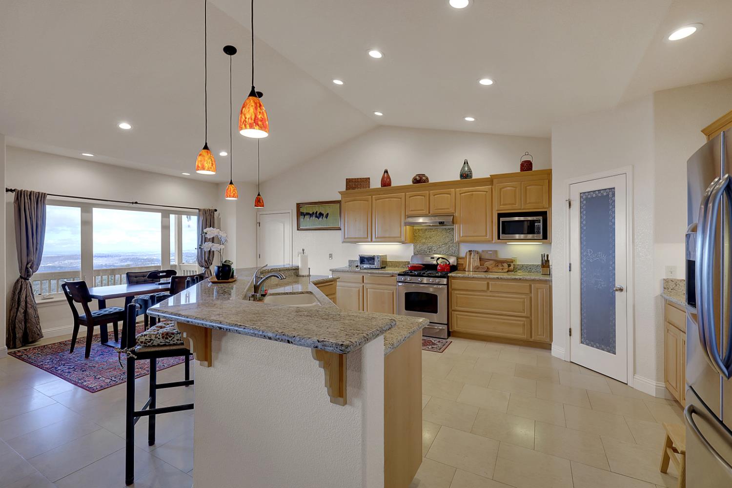 13680 Jessica Way Browns Valley, CA 95918 - Photo 17 of 73 a kitchen with stainless steel appliances kitchen island granite countertop a sink and cabinets