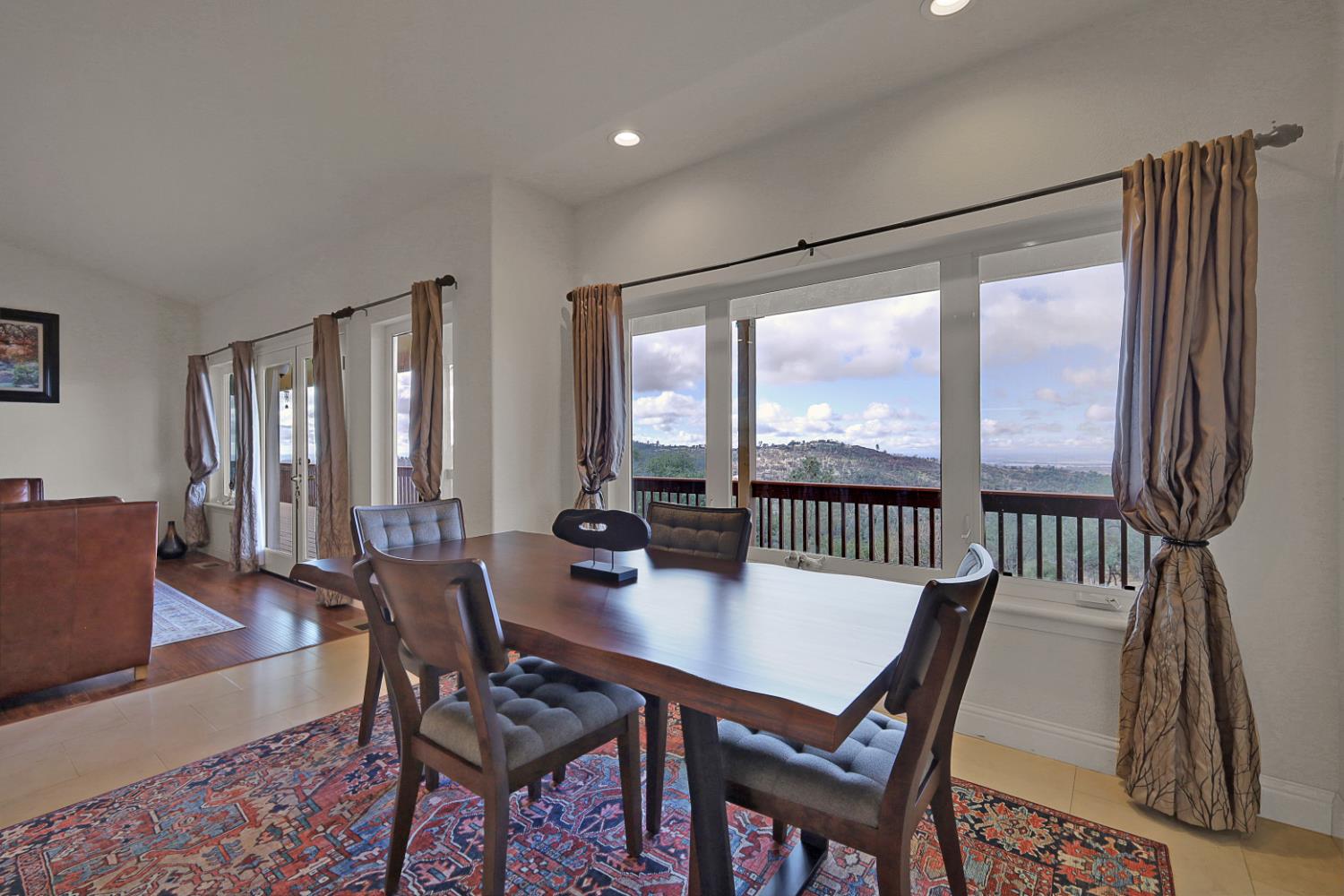 13680 Jessica Way Browns Valley, CA 95918 - Photo 20 of 73 a view of a dining room with furniture window and outside view