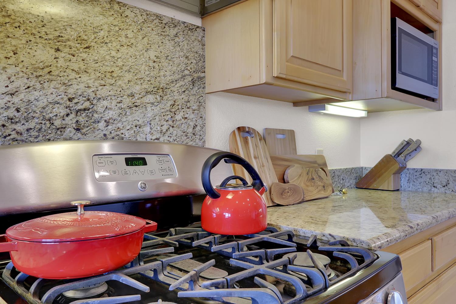 13680 Jessica Way Browns Valley, CA 95918 - Photo 27 of 73 a kitchen with stainless steel appliances granite countertop a stove a sink and a microwave
