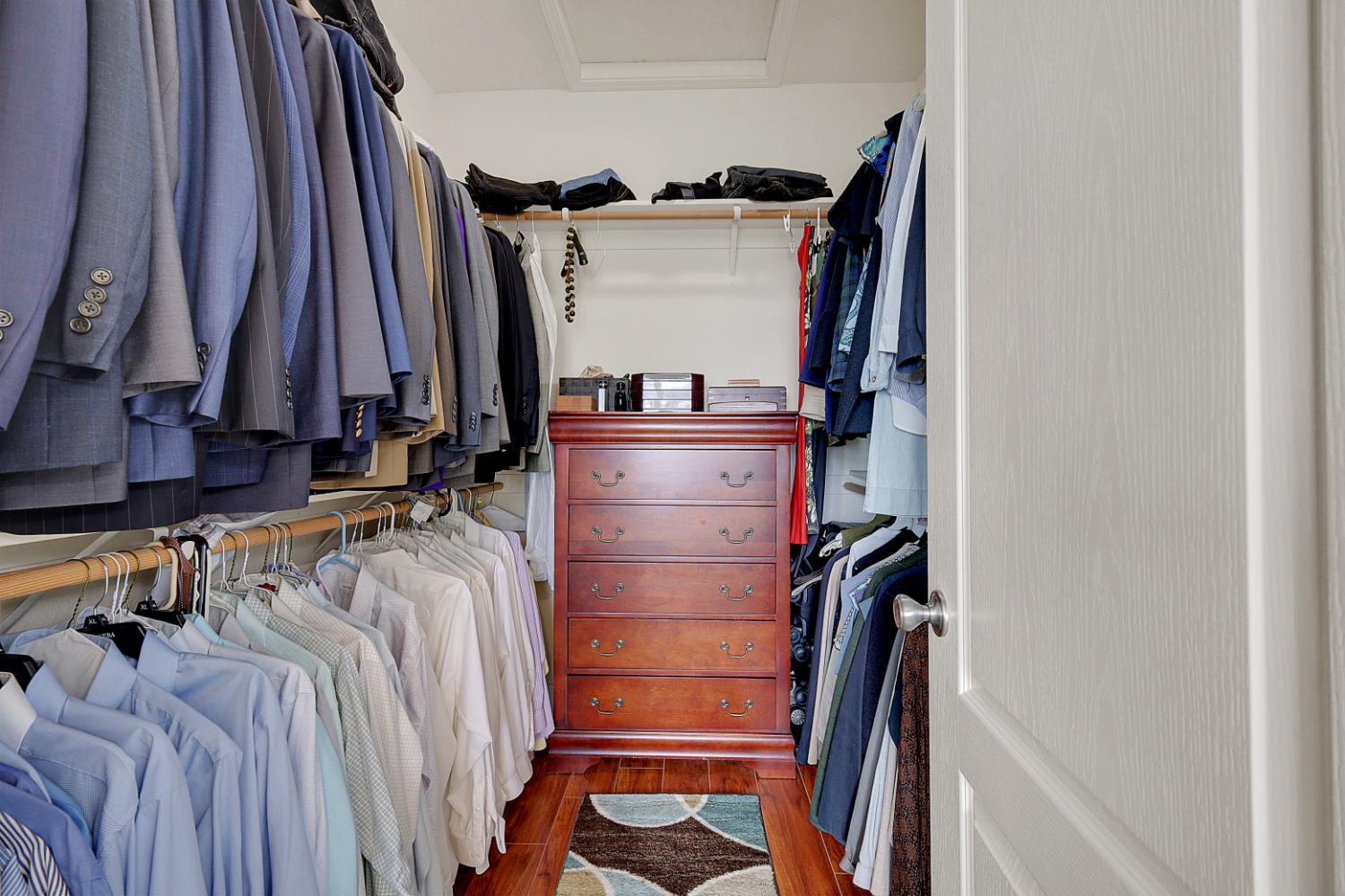 13680 Jessica Way Browns Valley, CA 95918 - Photo 42 of 74 a view of walk in closet with clothes and shoes