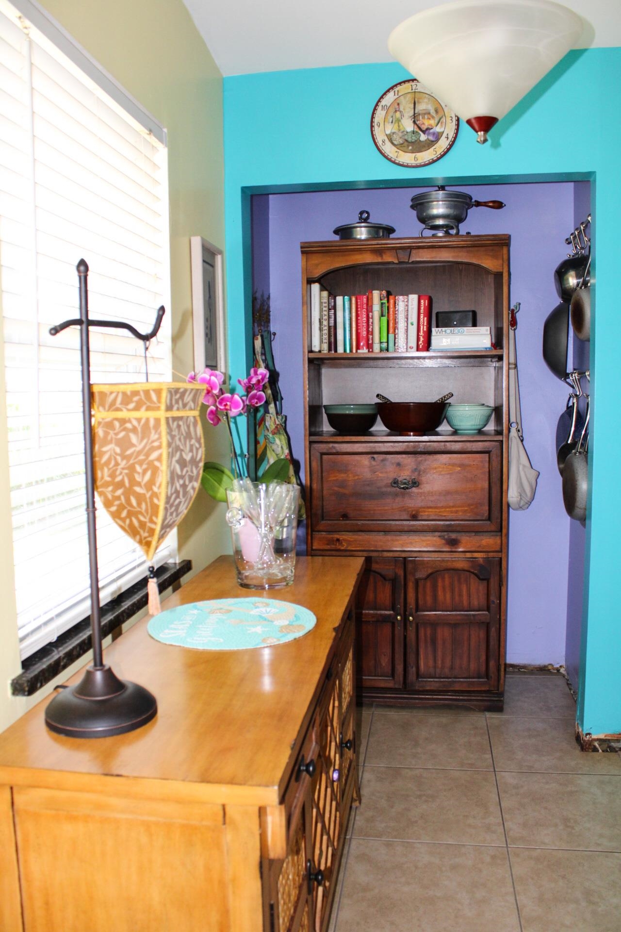 248 Spring Street St. Augustine, FL 32084 - Photo 18 of 50 a kitchen with a stove and a wooden floor