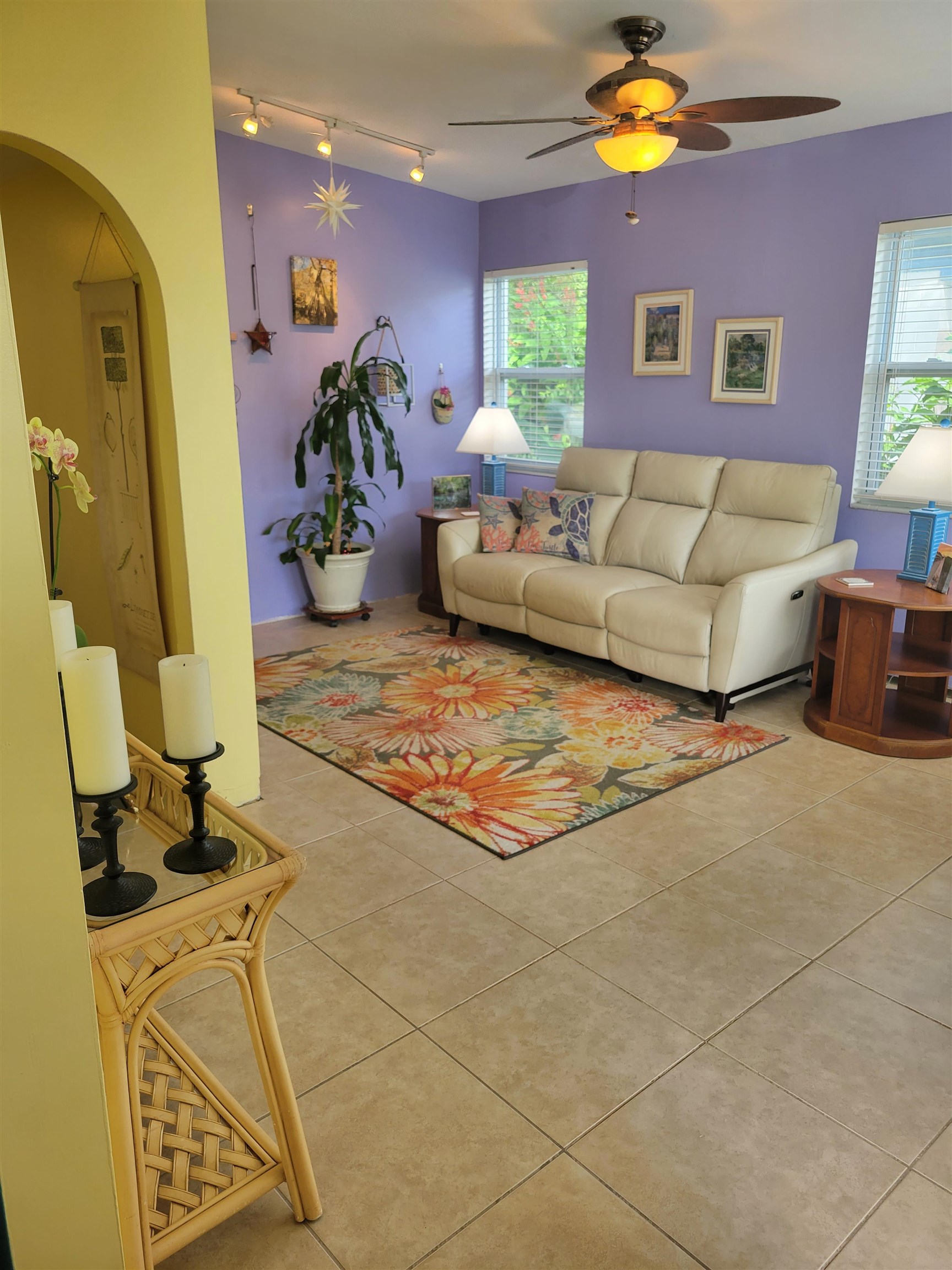 248 Spring Street St. Augustine, FL 32084 - Photo 20 of 50 a living room with furniture a chandelier and a window