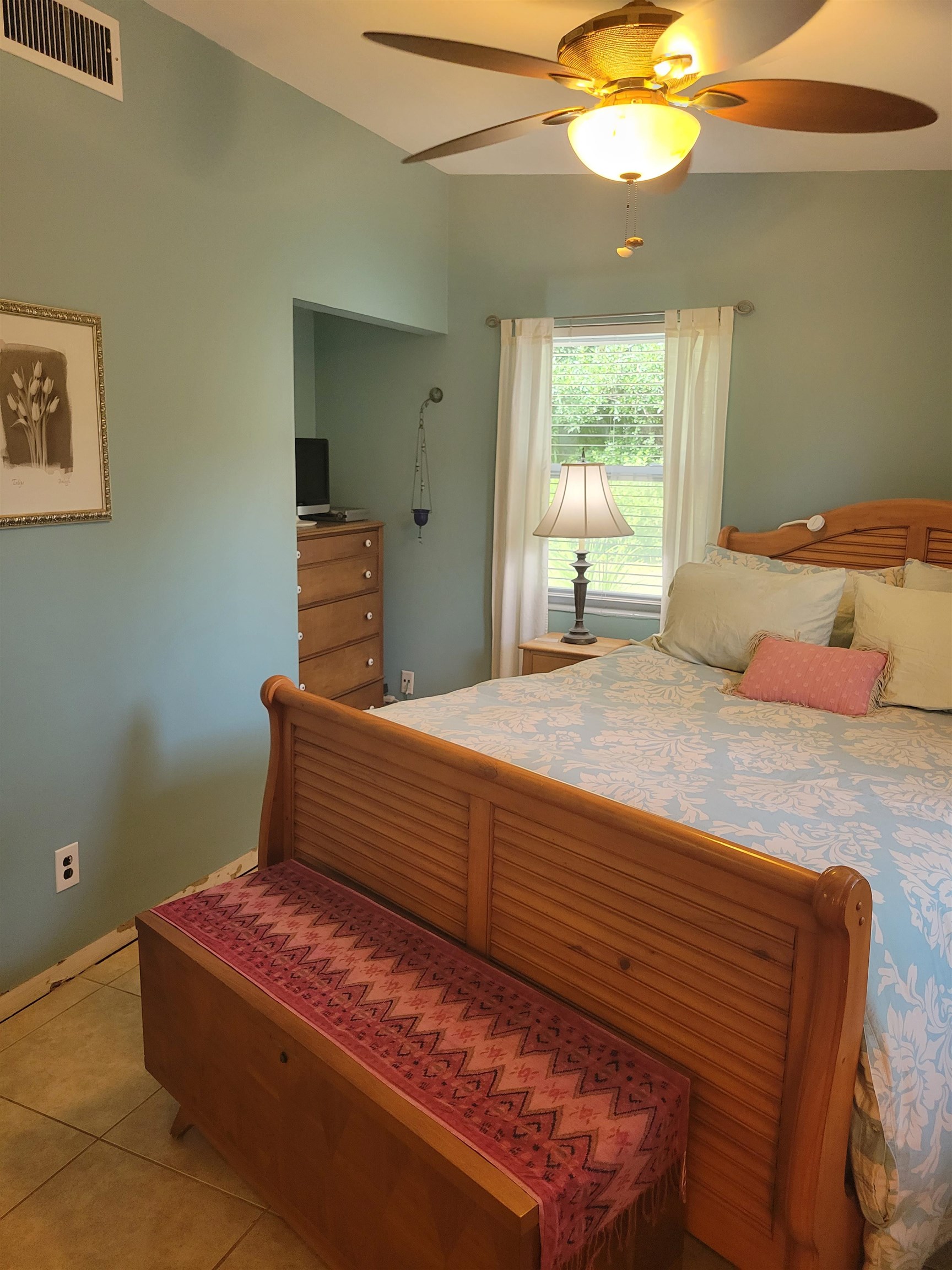 248 Spring Street St. Augustine, FL 32084 - Photo 22 of 50 a bedroom with a bed and window