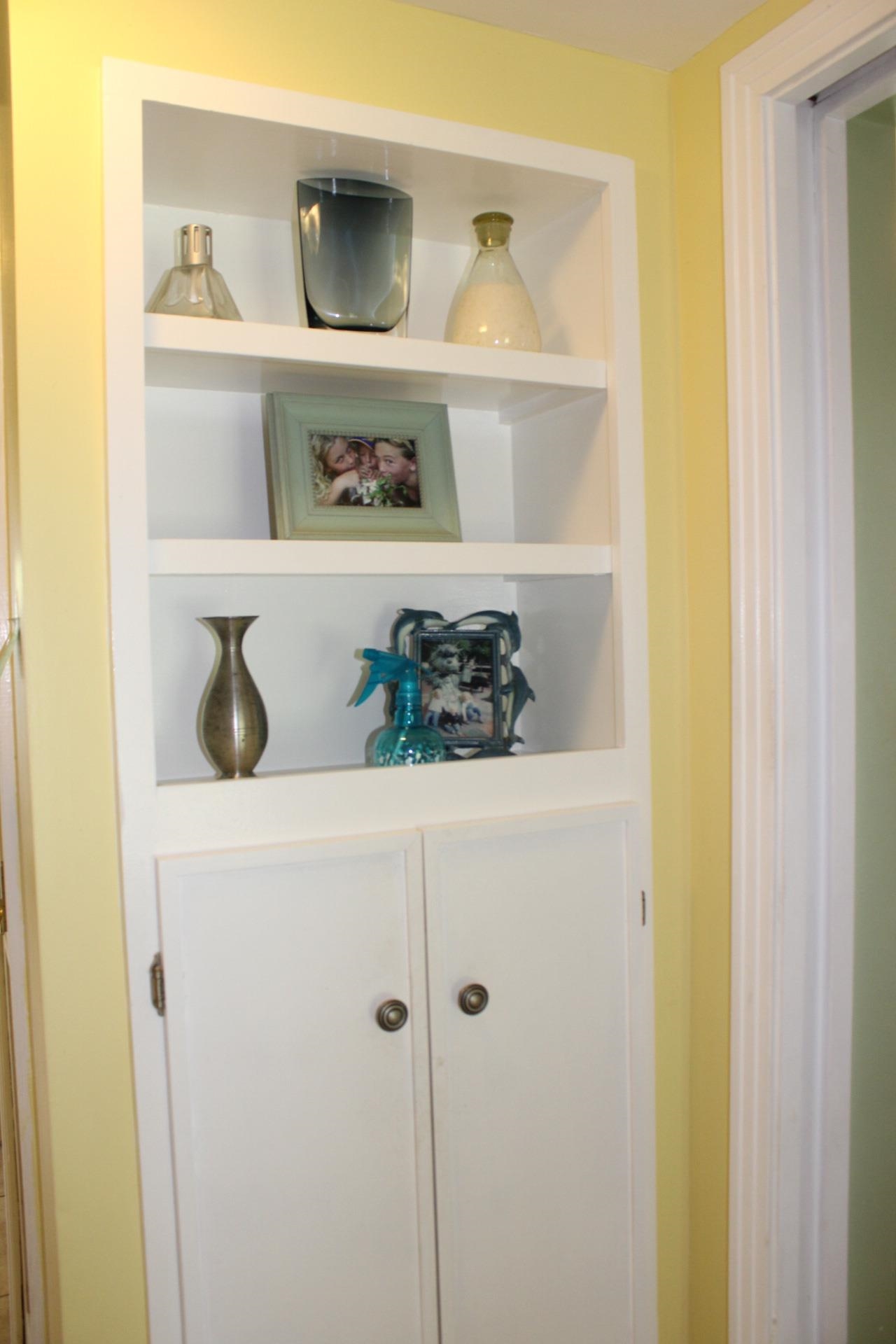 248 Spring Street St. Augustine, FL 32084 - Photo 29 of 50 a shelf with cup and plates