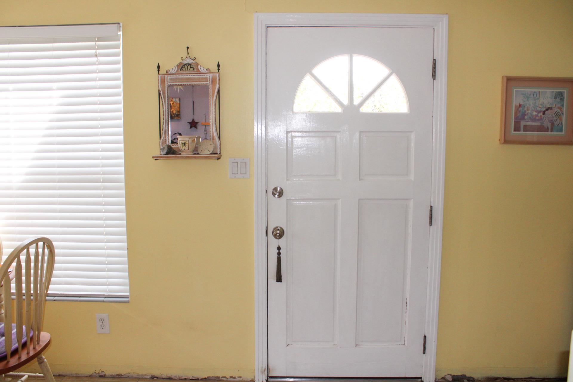 248 Spring Street St. Augustine, FL 32084 - Photo 44 of 50 a bathroom with a sink and a mirror