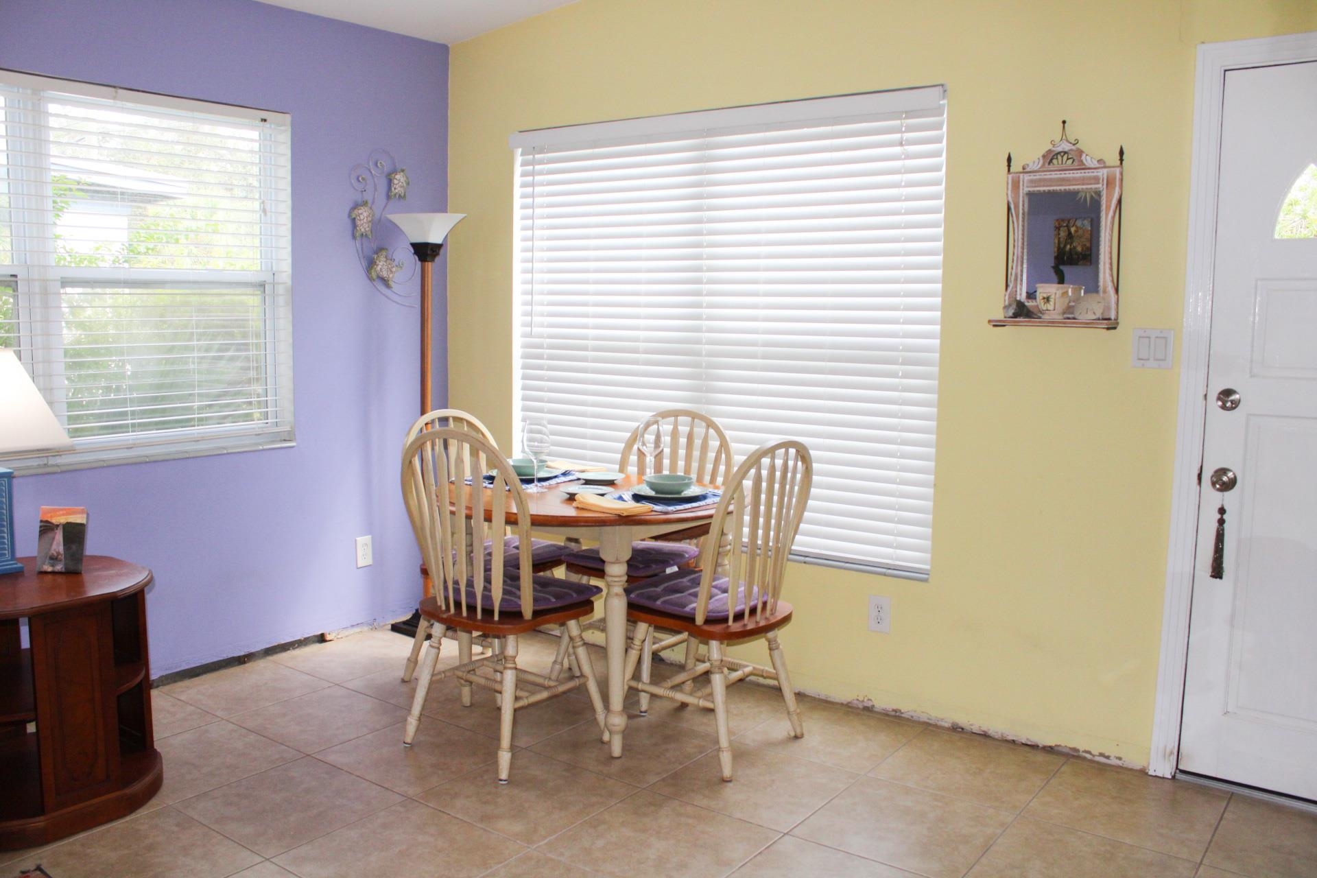 248 Spring Street St. Augustine, FL 32084 - Photo 6 of 50 a view of a dining room with furniture and window