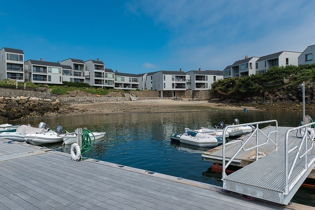 55 Brackett Place, Unit D Marblehead, MA 01945 - Photo 25 of 34 a view of a lake with sitting area