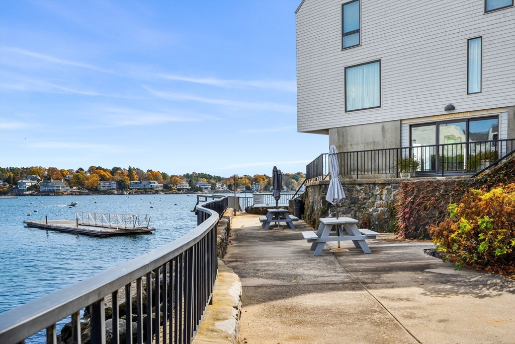 55 Brackett Place, Unit D Marblehead, MA 01945 - Photo 28 of 34 a view of a house with sitting area and furniture
