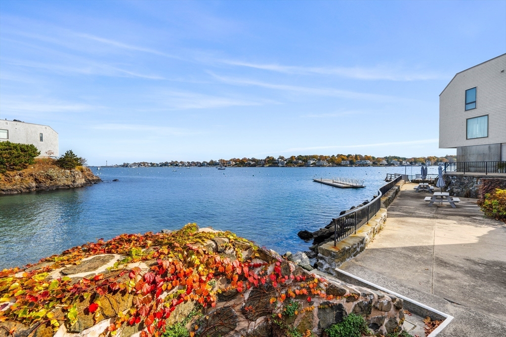 55 Brackett Place, Unit D Marblehead, MA 01945 - Photo 31 of 34 a view of a lake with a ocean view