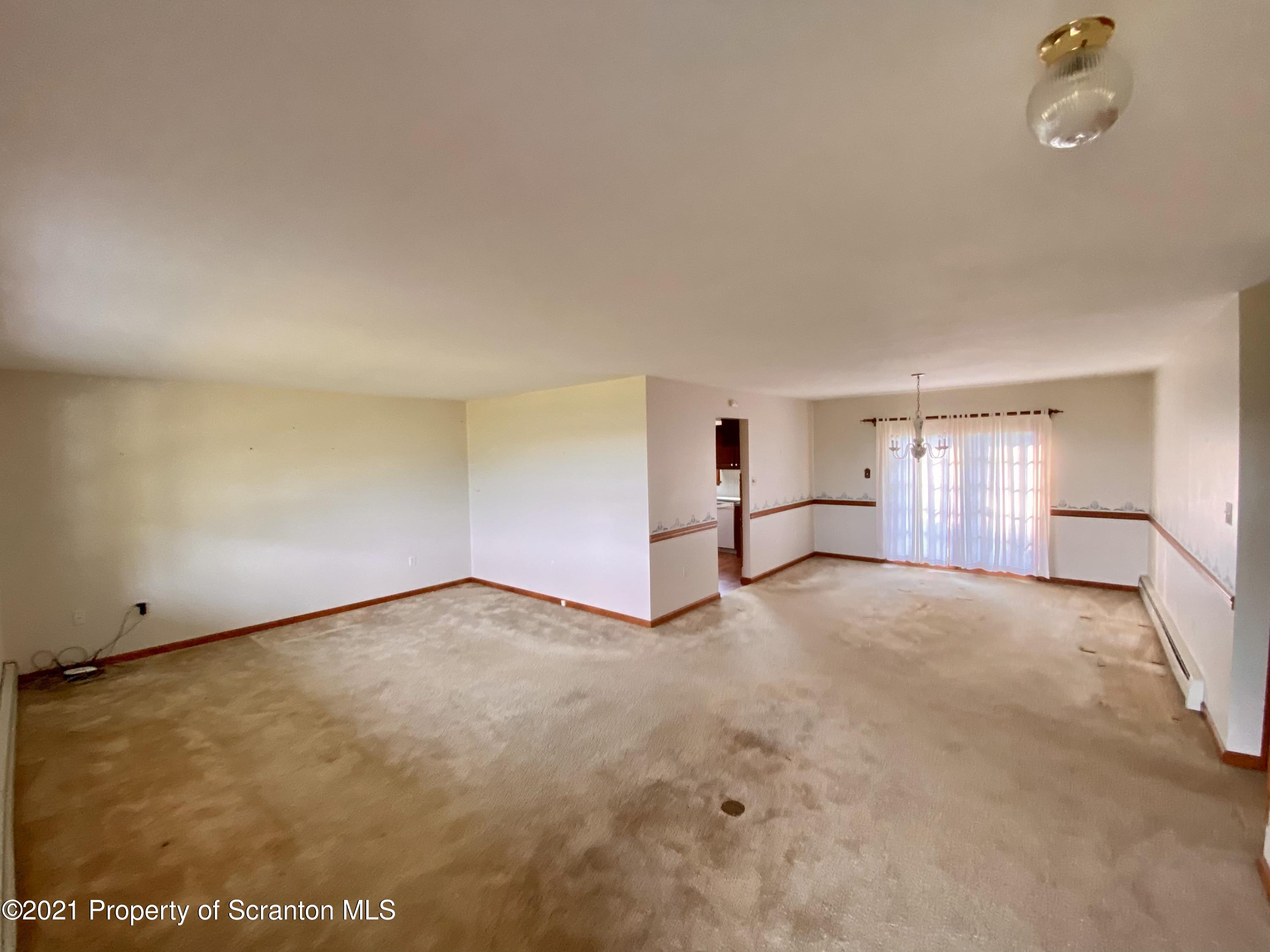 64 Thistle Hill Road Nicholson, PA 18446 - Photo 11 of 47 a view of an empty room with a window