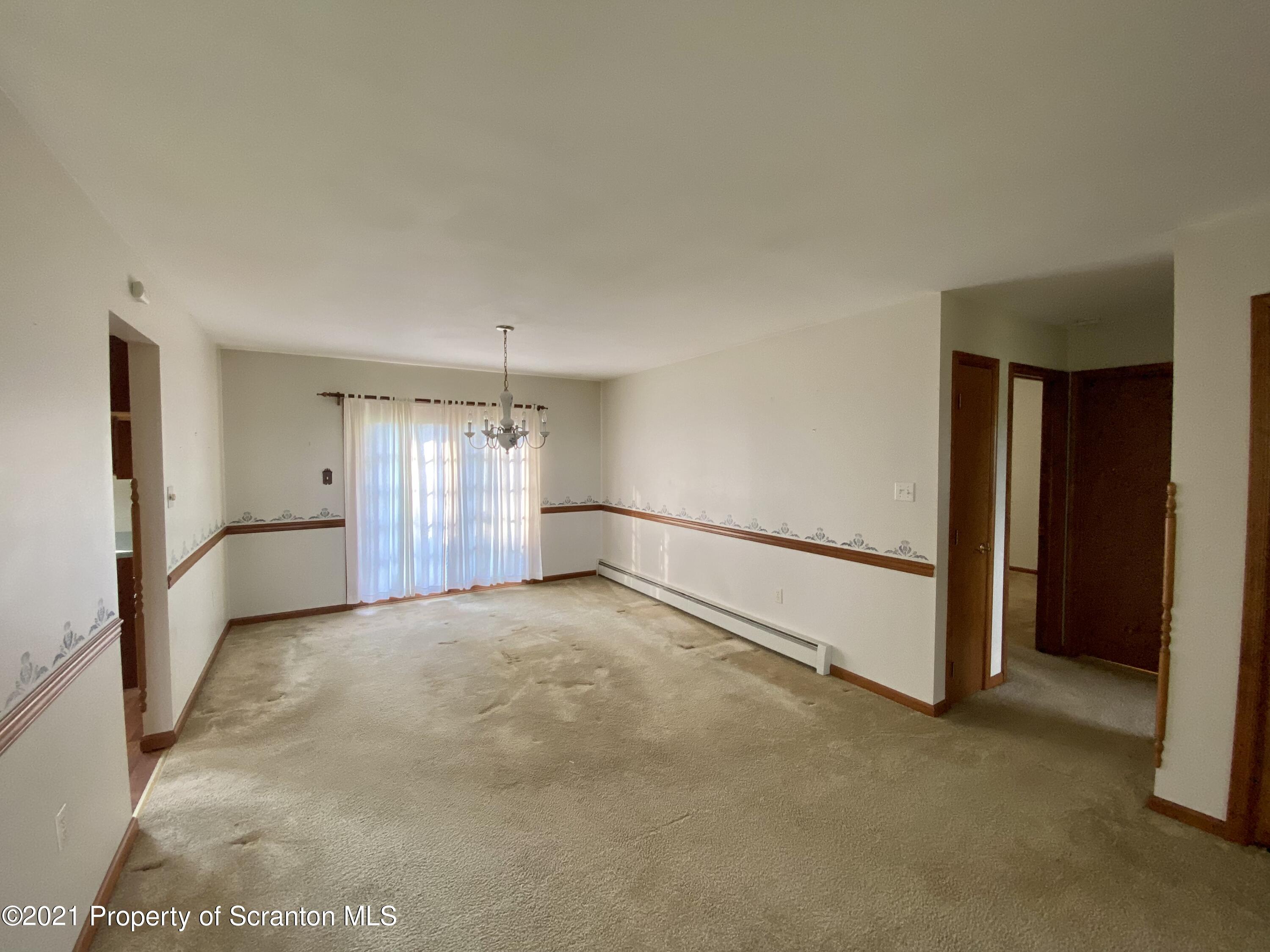 64 Thistle Hill Road Nicholson, PA 18446 - Photo 12 of 47 a view of an empty room with closet and a window