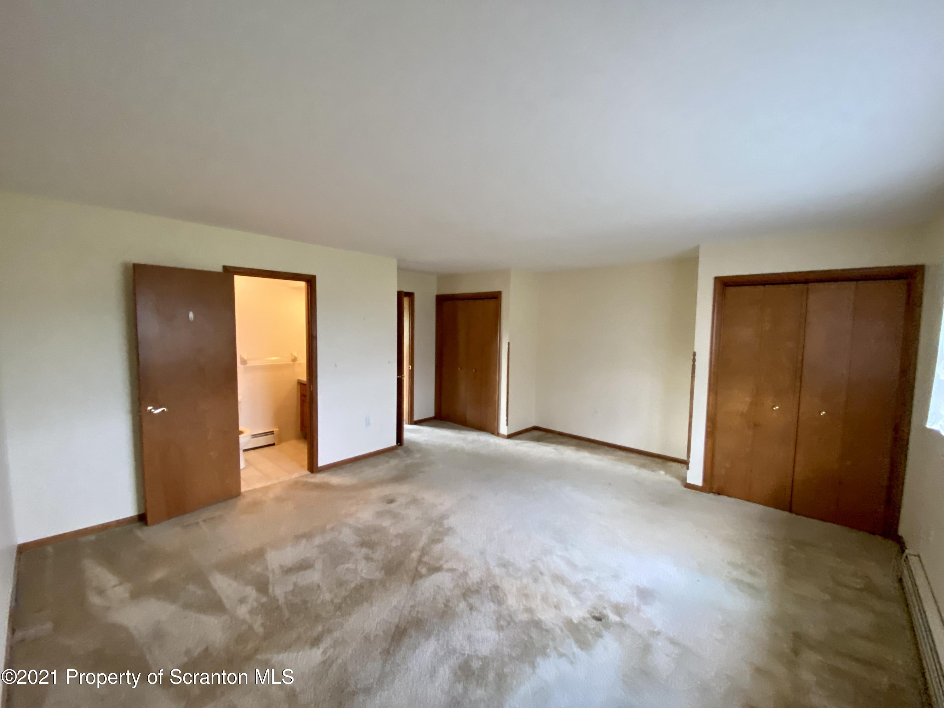 64 Thistle Hill Road Nicholson, PA 18446 - Photo 18 of 47 a view of an empty room with closet and entryway