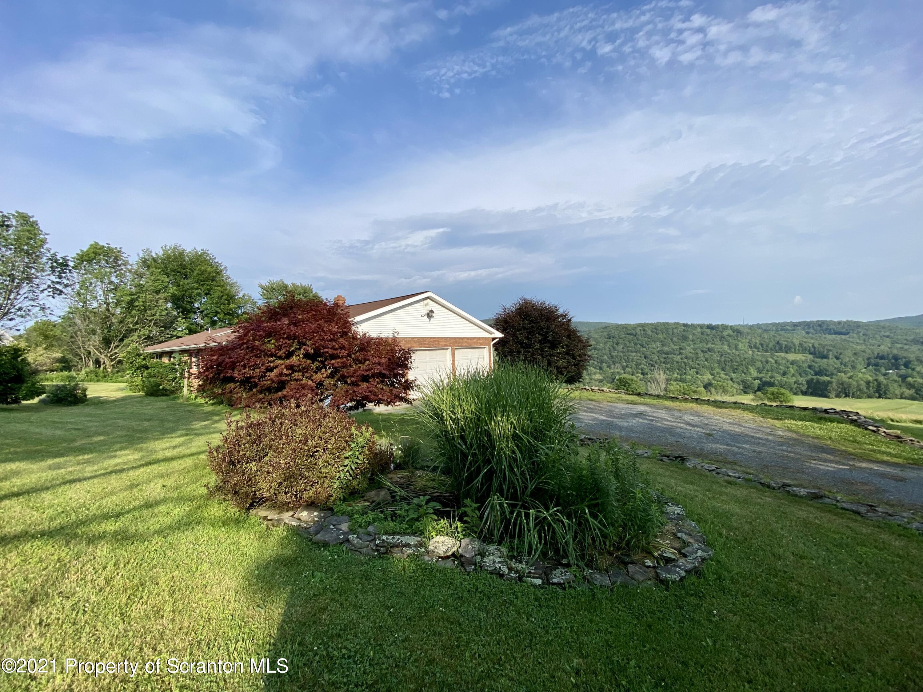 64 Thistle Hill Road Nicholson, PA 18446 - Photo 36 of 47 a view of an outdoor space and a yard