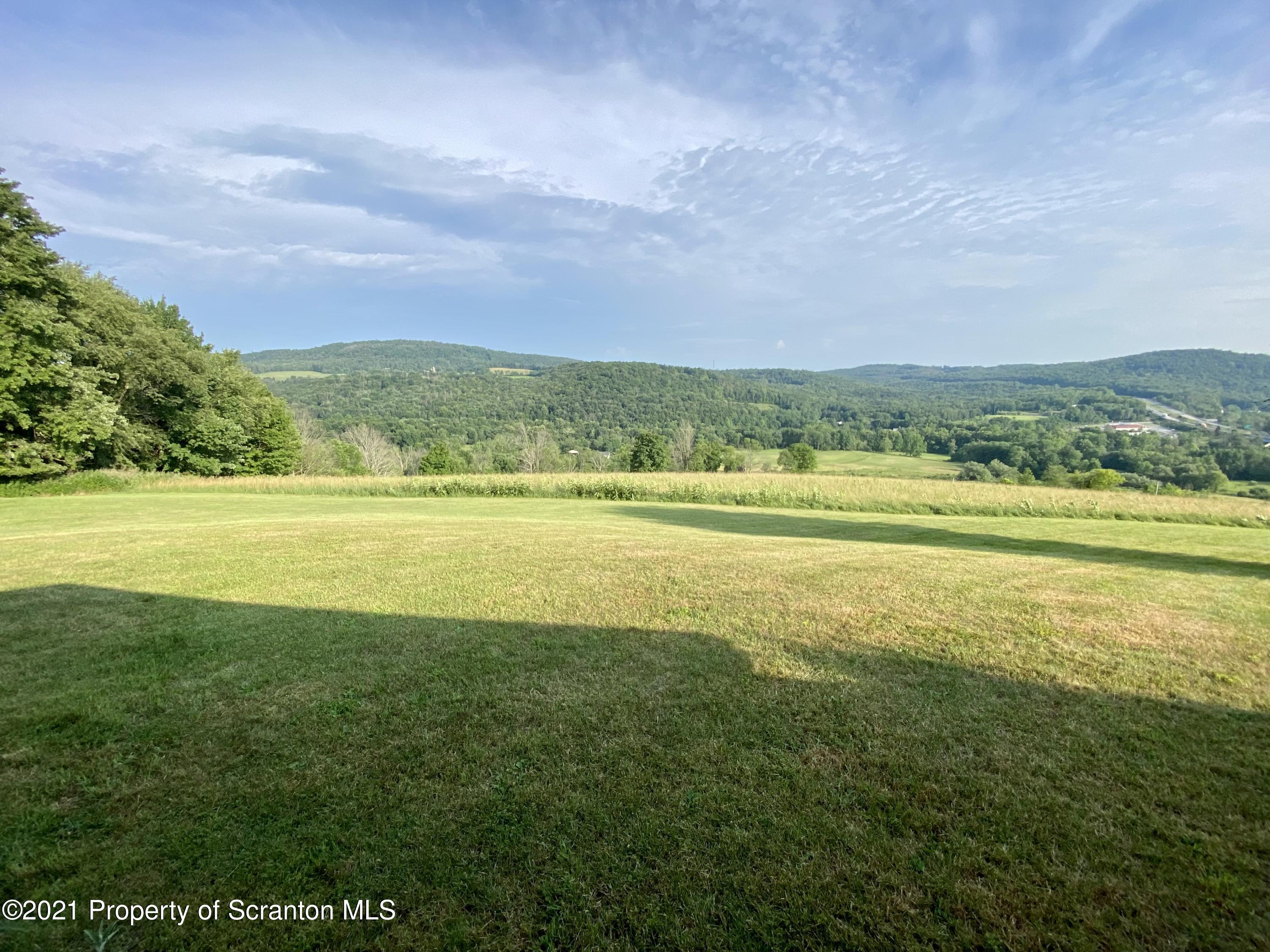 64 Thistle Hill Road Nicholson, PA 18446 - Photo 44 of 47 a view of an ocean and a mountain