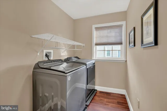 a utility room with washer and dryer
