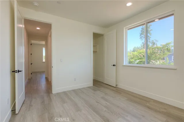 a kitchen with a sink a window and appliances