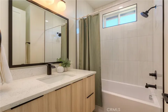 a kitchen with stainless steel appliances granite countertop a sink stove and microwave