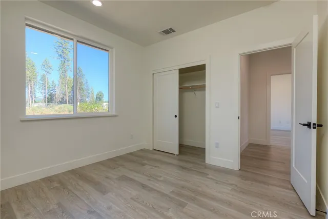 a view of a balcony with furniture and city view