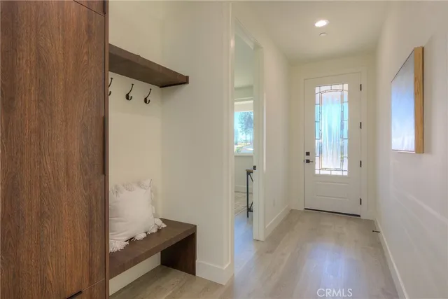 a kitchen with a table and chairs in it