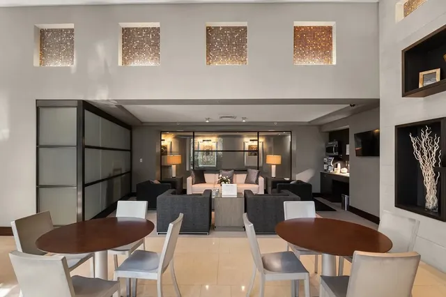 a view of a living room and window