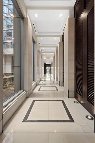 a room with furniture and a lamp