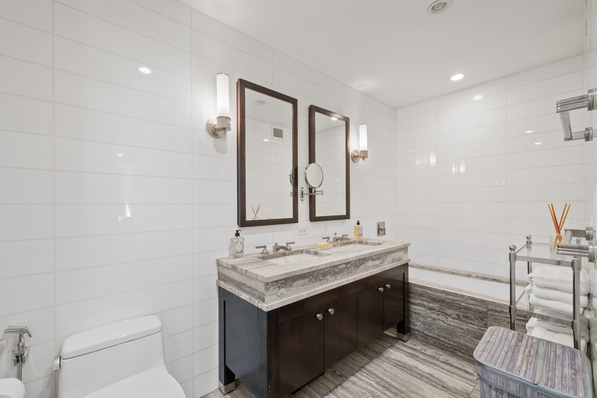 80 Riverside Boulevard, Unit 5S Manhattan, NY 10069 - Photo 8 of 24 a bathroom with a sink a toilet and a mirror