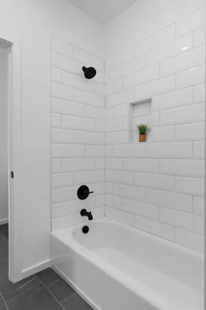 a bathroom with a bathtub