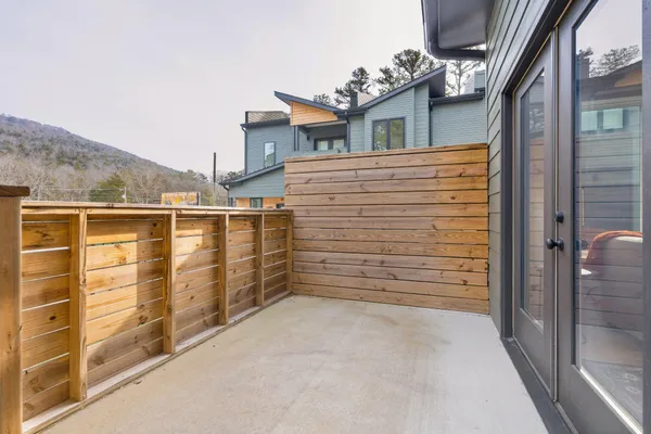 a view of a balcony with an outdoor space