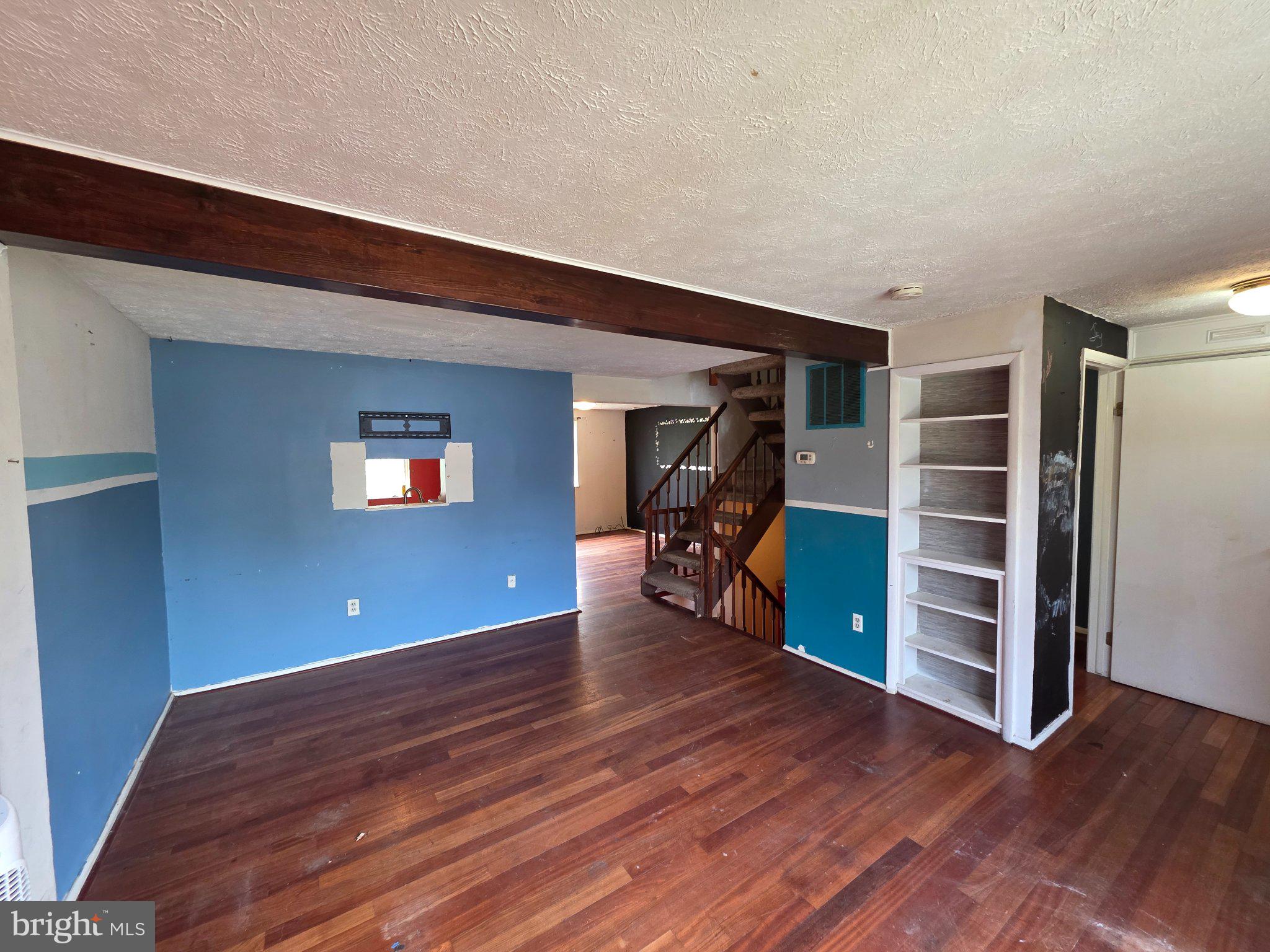 17005 Moss Side Lane, Unit 43 Olney, MD 20832 - Photo 4 of 7 Spacious living area with vibrant hues.