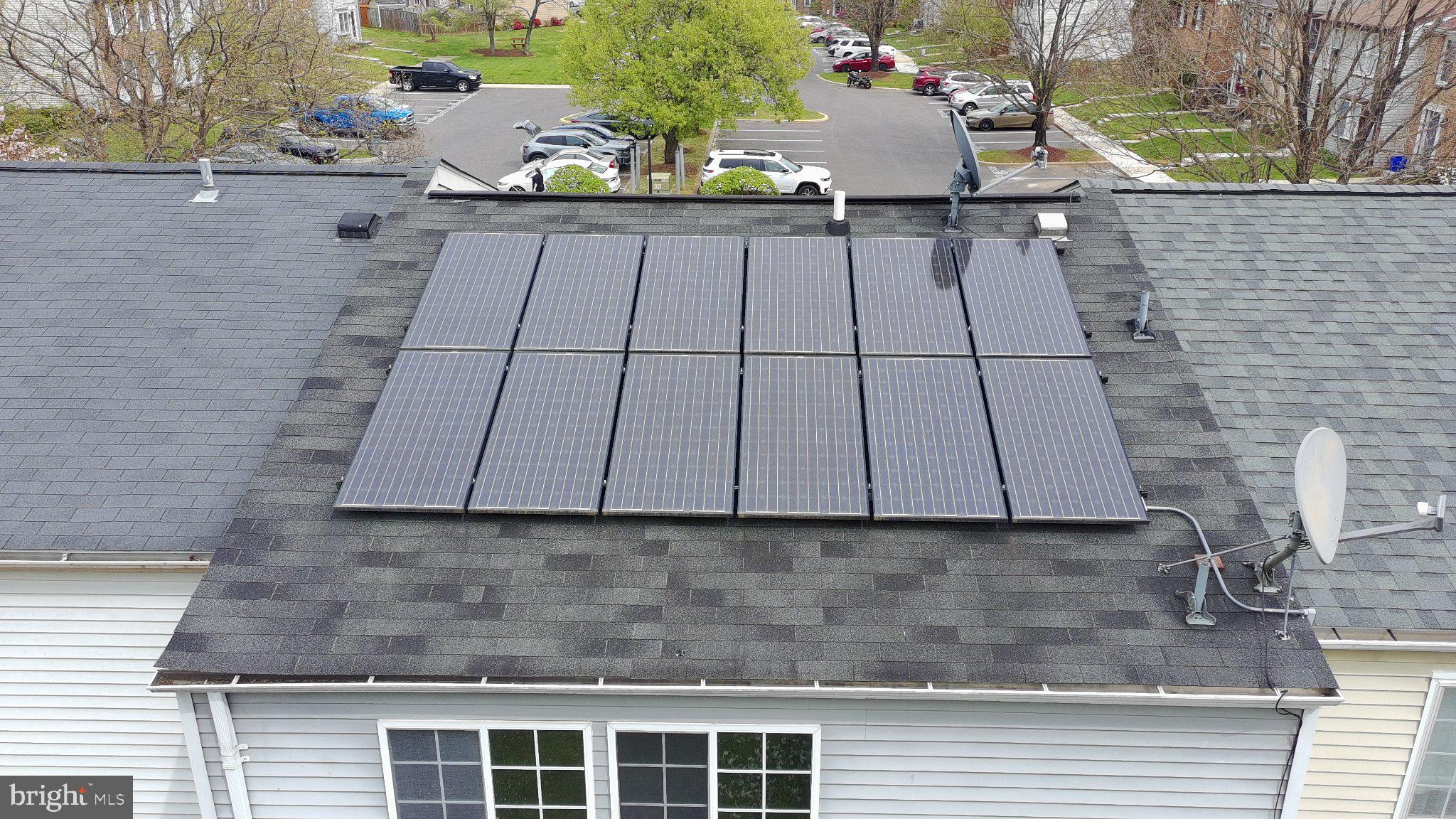 17005 Moss Side Lane, Unit 43 Olney, MD 20832 - Photo 7 of 7 Eco-friendly solar panels shine bright.
