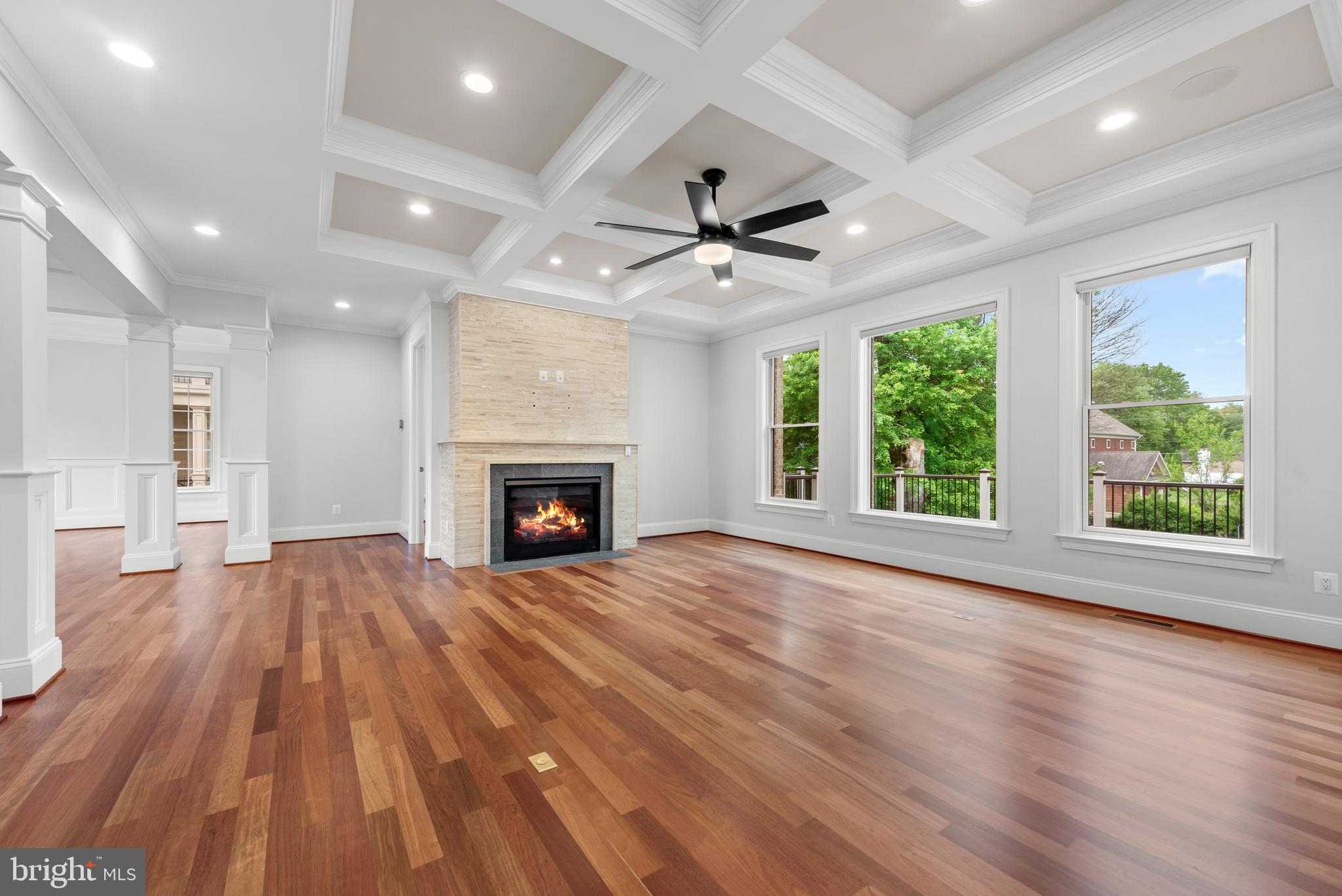 7003 Churchill Road McLean, VA 22101 - Photo 16 of 76 a view of an empty room with wooden floor and a window